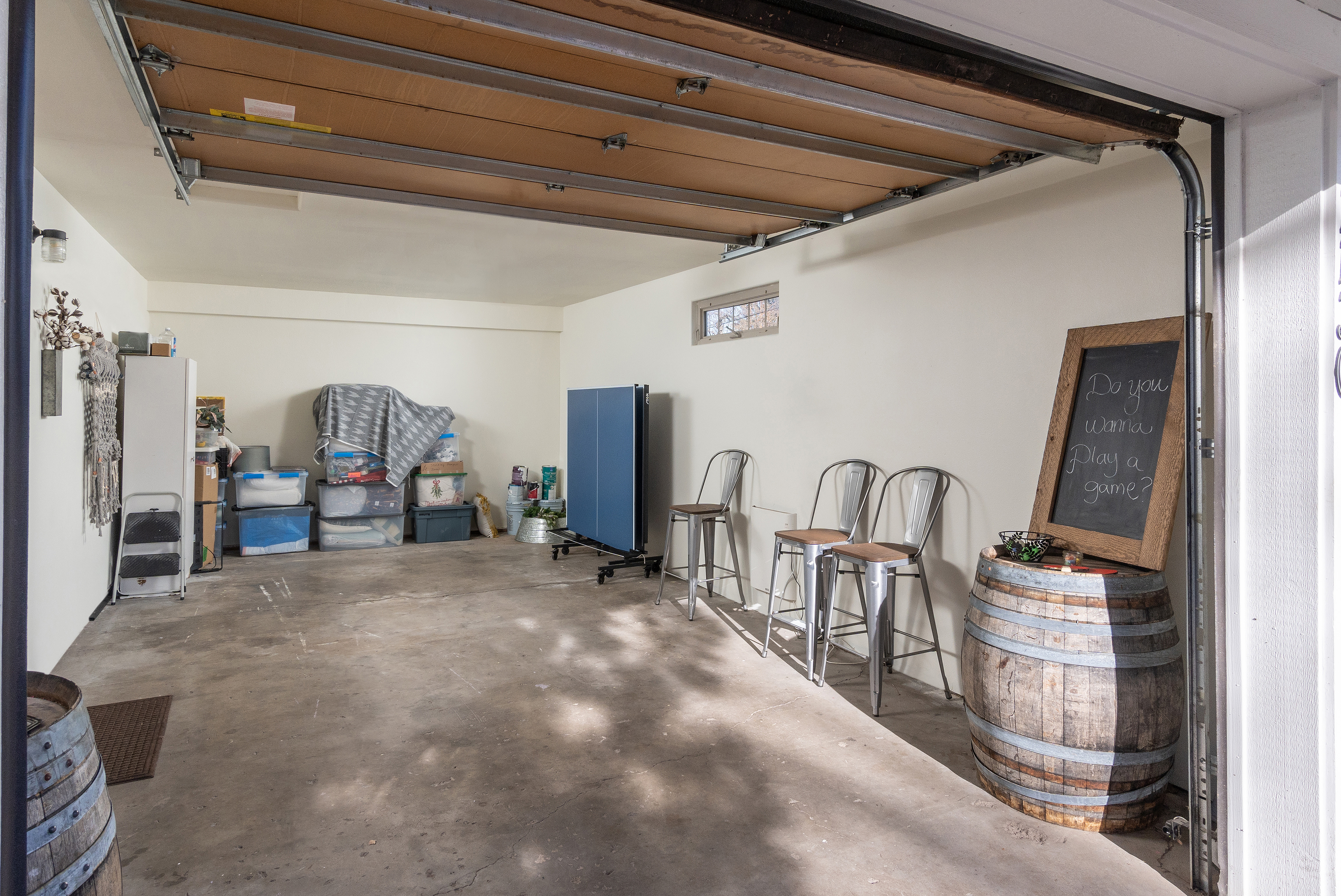 Cluttered garage before transformation